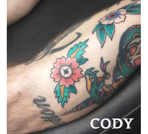 Explore tigger tattoo ideas, creative tattoo ideas in Benton, available at Relics Tattoo Studio