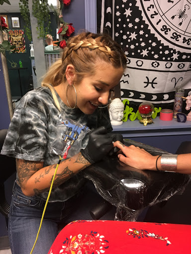 Explore frog tattoo ideas, creative tattoo ideas in Kent, available at War Horse Ink