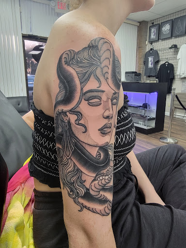 Explore road tattoo ideas, creative tattoo ideas in Ocala, available at Black Lotus Tattoo & Art Gallery Inc