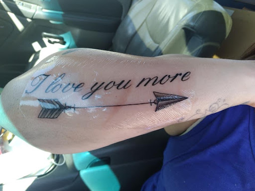 Explore mens tattoo cover up ideas, creative tattoo ideas in Fernley, available at Purple orchid tattoo and piercing