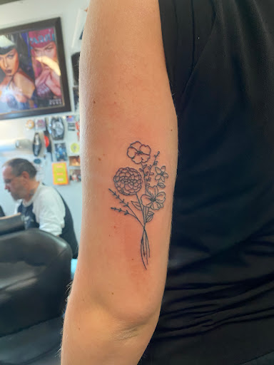 Explore barb wire tattoo ideas, creative tattoo ideas in Pigeon Forge, available at American Rebel Tattoo Studio