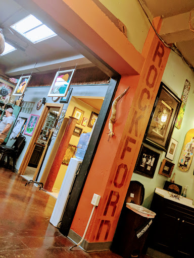 Explore tiger lily tattoo ideas, creative tattoo ideas in Rockford, available at Delicious Ink Tattoo & Piercing