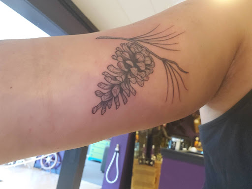 Explore tribal sun tattoo ideas, creative tattoo ideas in Palmyra, available at In the Mirror Tattoo