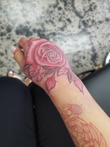 Explore couple name tattoo ideas, creative tattoo ideas in Grand Rapids, available at The ARTS Tattoo Studio