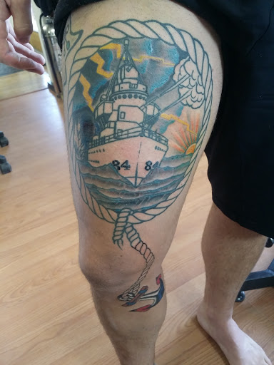 Explore tattoo ideas for mens leg, creative tattoo ideas in Wenatchee, available at Rebels Tattoo Studio