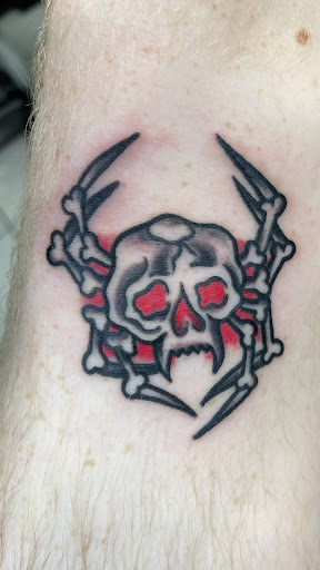 Explore rose hand tattoo ideas, creative tattoo ideas in Green Bay, available at Sanctuary Tattoo Studio