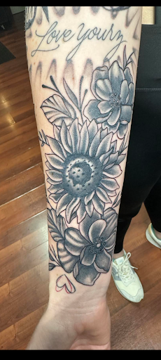 Explore swirl tattoo ideas, creative tattoo ideas in Shippensburg, available at LAZY WIZARD TATTOOS
