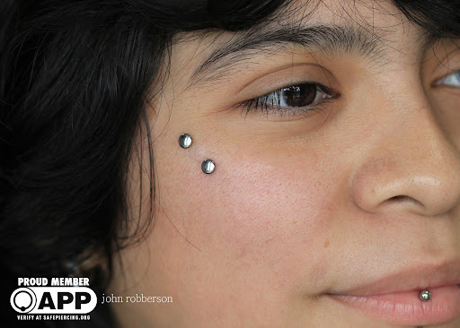 Explore trumpet tattoo ideas, creative tattoo ideas in Fort Myers, available at Tiger Lotus Tattoo and Piercing