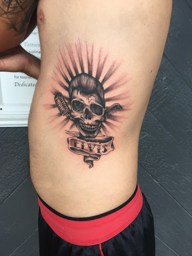 Explore adventurer tattoo ideas, creative tattoo ideas in Myrtle Beach, available at Elite Ink Tattoos of Myrtle Beach