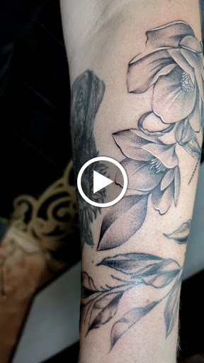 Explore tattoo ideas for music lovers, creative tattoo ideas in Longwood, available at Trinity Tattoo Co Inc