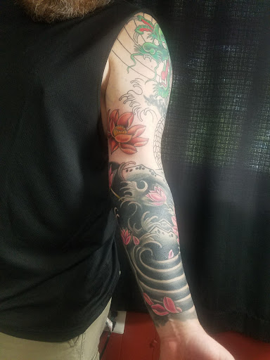 Explore samurai tattoo sleeve ideas, creative tattoo ideas in Knoxville, available at American Tattoo Studio