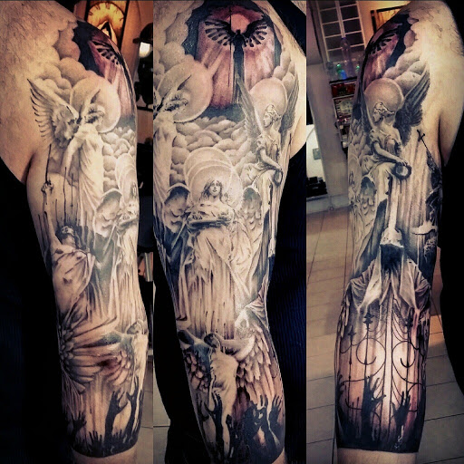 Explore leg tattoo men ideas, creative tattoo ideas in Chicago, available at Royal Flesh Tattoo and Piercing