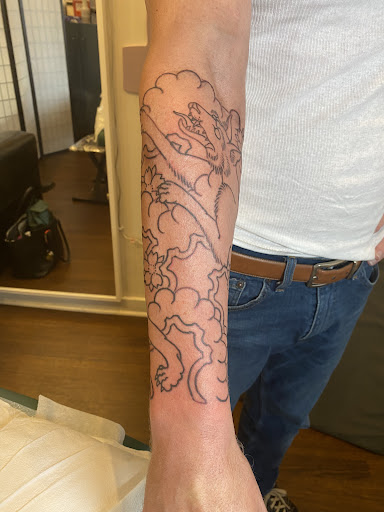 Explore side tattoo ideas for females, creative tattoo ideas in Pittsburgh, available at Black Cat Tattoos