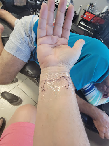 Explore women sleeve tattoo ideas, creative tattoo ideas in Ocoee, available at Slaughterized Ink Tattoo and Piercing Studio