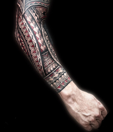 Explore red cardinal tattoo ideas, creative tattoo ideas in Pompano Beach, available at Torres Tattoo Studio