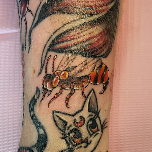 Explore tattoo ideas for athletes, creative tattoo ideas in Palm Harbor, available at Angry Owl Tattoo and Piercing