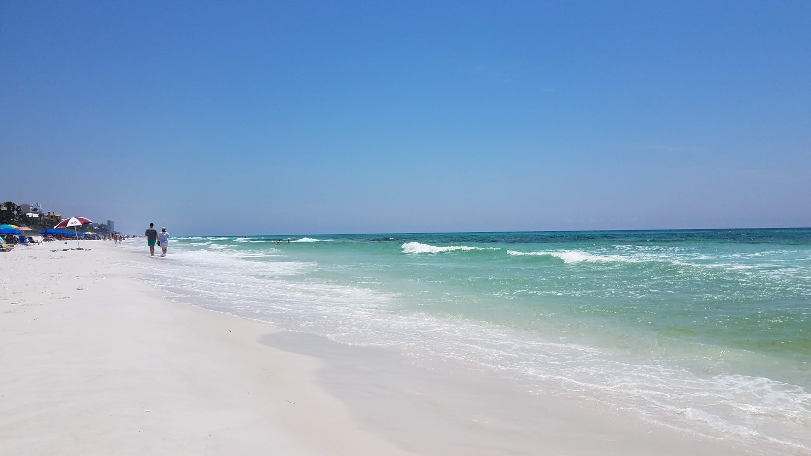 Photo of Seagrove Beach with turquoise pure water surface
