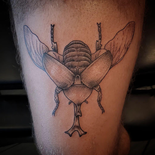 Explore bottom sleeve tattoo ideas, creative tattoo ideas in Palm Harbor, available at Angry Owl Tattoo and Piercing