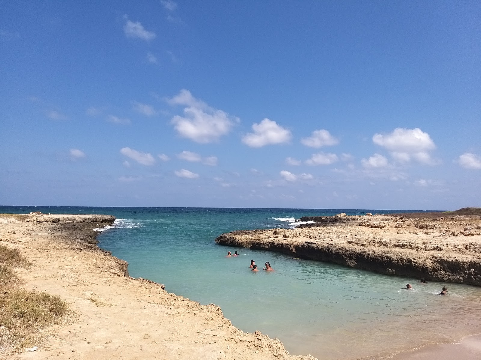Foto von Costa Merlata beach mit teilweise sauber Sauberkeitsgrad
