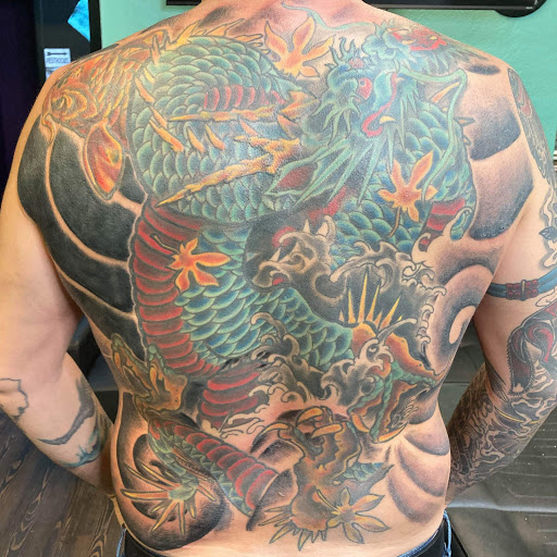 Explore tattoo sleeve filler ideas for a woman, creative tattoo ideas in Mckinney, available at Borrowed Time Fine Art Gallery Tattoo Shop