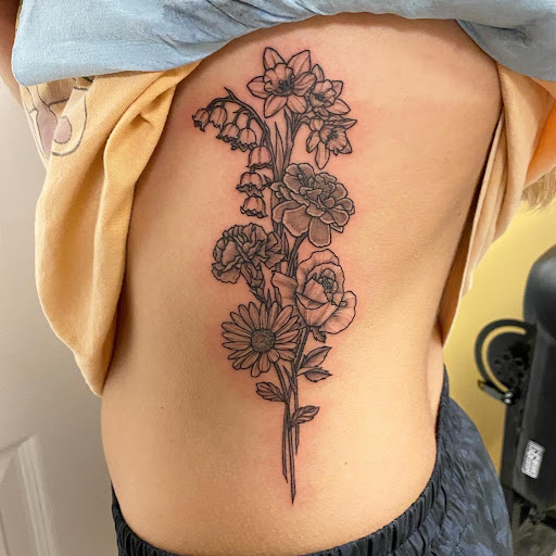 Explore tattoo ideas for weightlifters, creative tattoo ideas in Warner Robins, available at Untold Pain Tattoo Studio