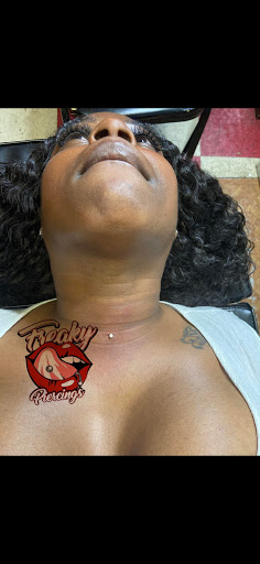 Explore neck tattoo idea, creative tattoo ideas in Detroit, available at Freaky Piercings