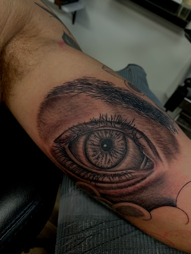 Explore pet memorial tattoo ideas, creative tattoo ideas in Mount Clemens, available at Hand & Heart Tattoo