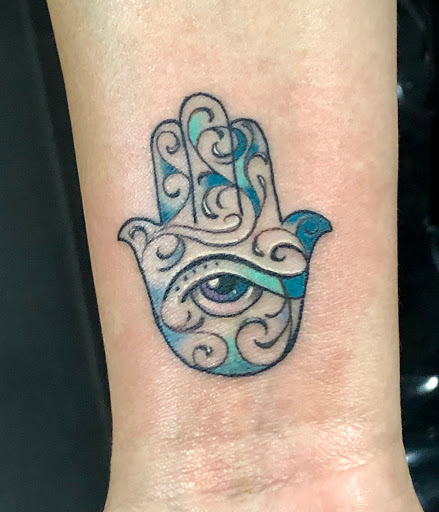 Explore upper arm tattoo ideas for women, creative tattoo ideas in Miami Beach, available at Empire Ink, South Beach