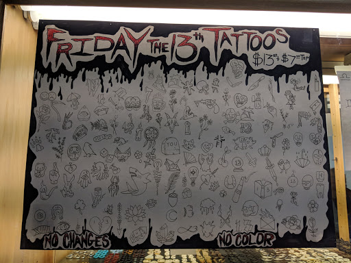 Find tattoo business cards ideas for your next unique tattoo in Santa Fe at Talisman Body Art