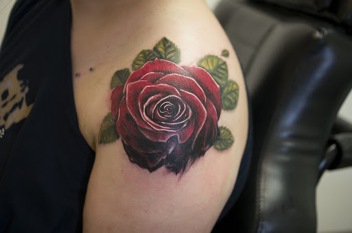Explore alice and wonderland tattoo ideas, creative tattoo ideas in Denison, available at Calypso Tattoo
