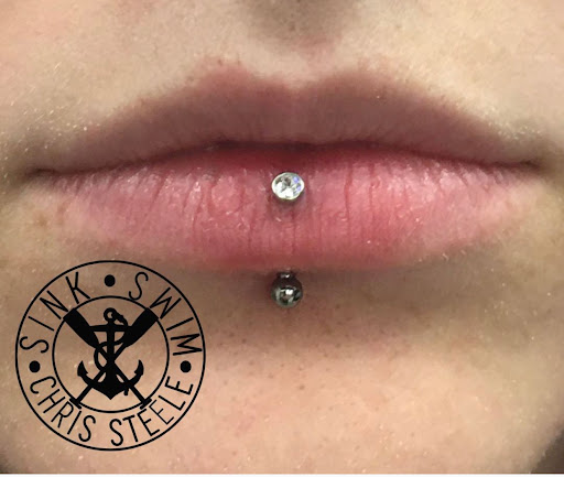 Explore american traditional elbow tattoo ideas, creative tattoo ideas in Marietta, available at Sink or Swim Studio and Gallery