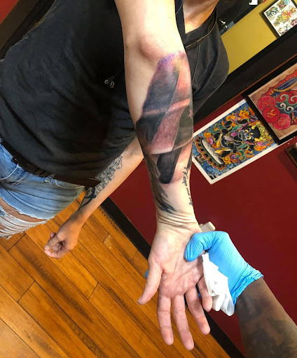 Explore cake tattoo ideas, creative tattoo ideas in Goose Creek, available at Red Kirin Tattoo