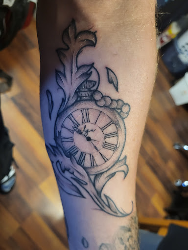 Explore cross forearm tattoo ideas, creative tattoo ideas in Saint Charles, available at Frenchtown Tattoo Company