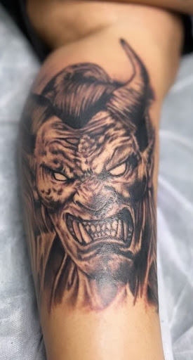 Explore spine tattoo ideas for men, creative tattoo ideas in La Habra, available at Raining Ink Tattoo Studio