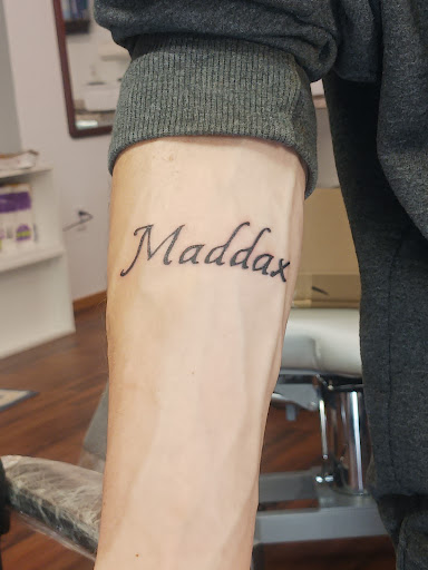 Explore tattoo ideas for women's legs, creative tattoo ideas in Green Bay, available at SPITFIRE CREATIONS