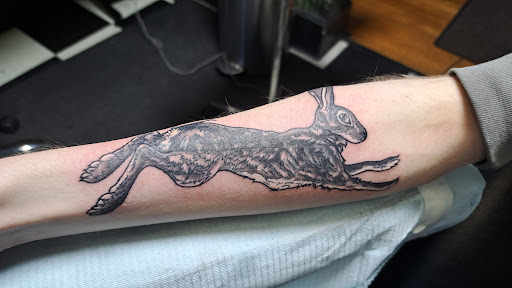 Find cool tattoo ideas for females for your next unique tattoo in Medina at Art In Motion Inc Tattooing