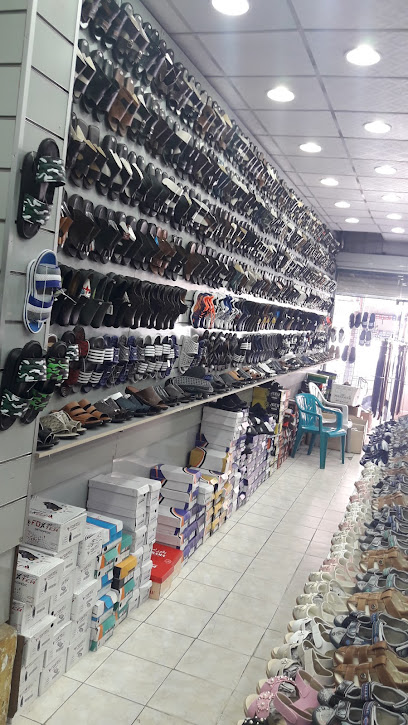 محل عبد الرحمن لتصليح الاحذية و الشنط