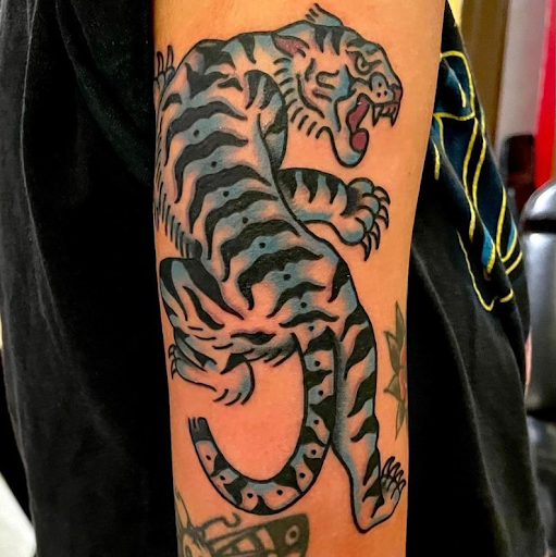 Explore tattoo ideas on hand, creative tattoo ideas in Fort Lauderdale, available at Electric Street Tattoo