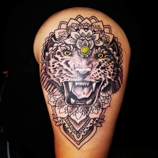 Explore tattoo ideas for upper arm, creative tattoo ideas in Fairmont, available at Derma Doodlezz