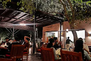 Under the jamun tree restaurant image