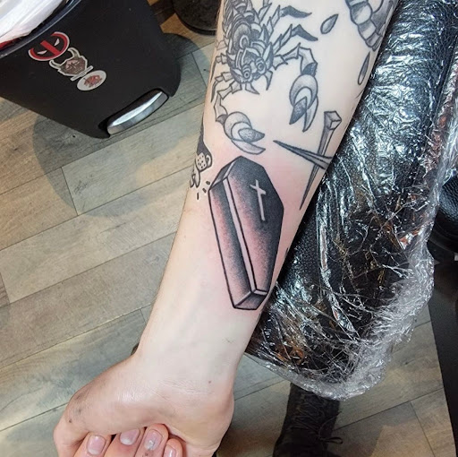 Explore invincible tattoo ideas, creative tattoo ideas in Virginia Beach, available at World Famous Blue Horseshoe Tattoo and Piercing Independence