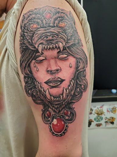 Explore cover up tattoo ideas on shoulder, creative tattoo ideas in Rogers, available at Saved by Grace Tattoo Studio