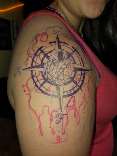 Find leo constellation tattoo ideas for your next unique tattoo in Wylie at Scarecrow Galleries Tattoo Company