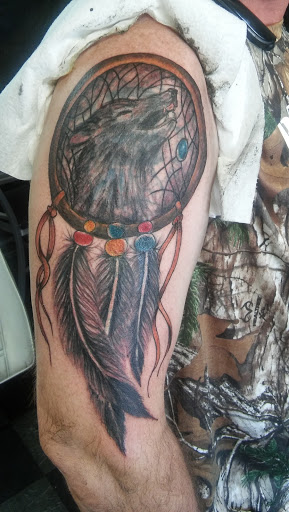 Explore dog paw tattoo ideas, creative tattoo ideas in Big Spring, available at A Mom & Pop Tattoo Shop