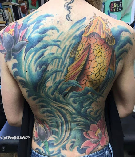 Explore ripped skin tattoo ideas, creative tattoo ideas in Fairfax, available at Marlowe Ink Tattoo Fairfax