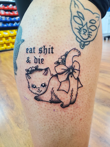 Explore banger tattoo ideas, creative tattoo ideas in Cocoa, available at Rorschach Tattoo Shop and Piercing Studio