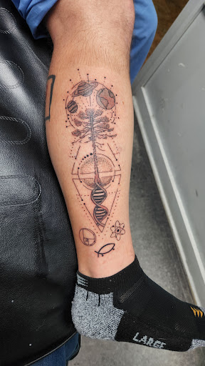 Explore hip hop tattoo ideas, creative tattoo ideas in Hendersonville, available at Evolutionary Studios