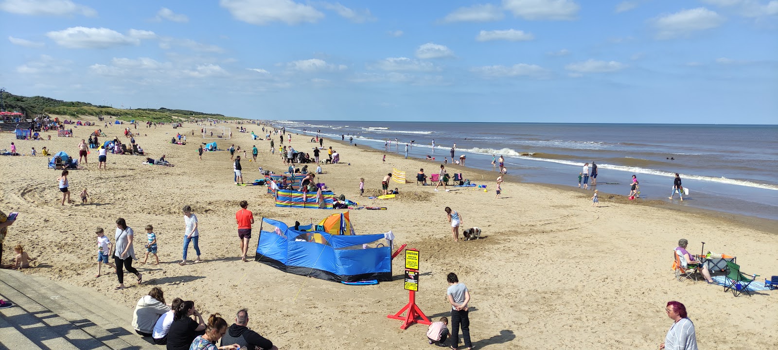 Foto de Playa de Huttoft con arena beige superficie