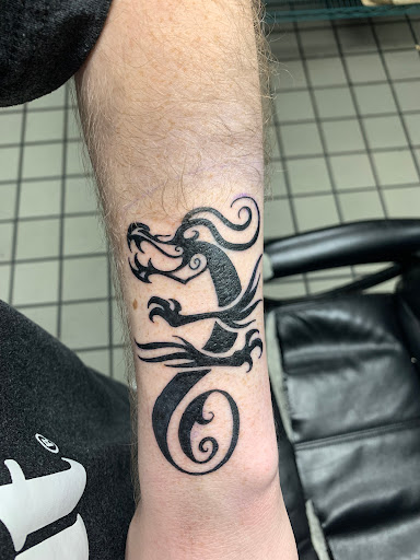Explore dark romance tattoo ideas, creative tattoo ideas in Richmond, available at Heroes & Ghosts Tattoo