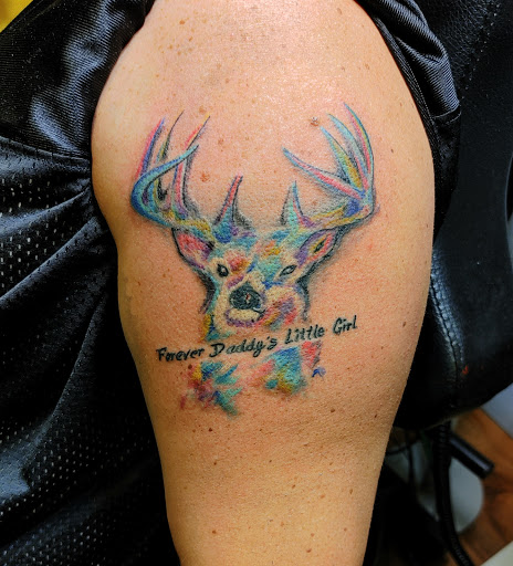 Explore new born tattoo ideas, creative tattoo ideas in Lafayette, available at DragonsBane Tattoo & Body Piercing